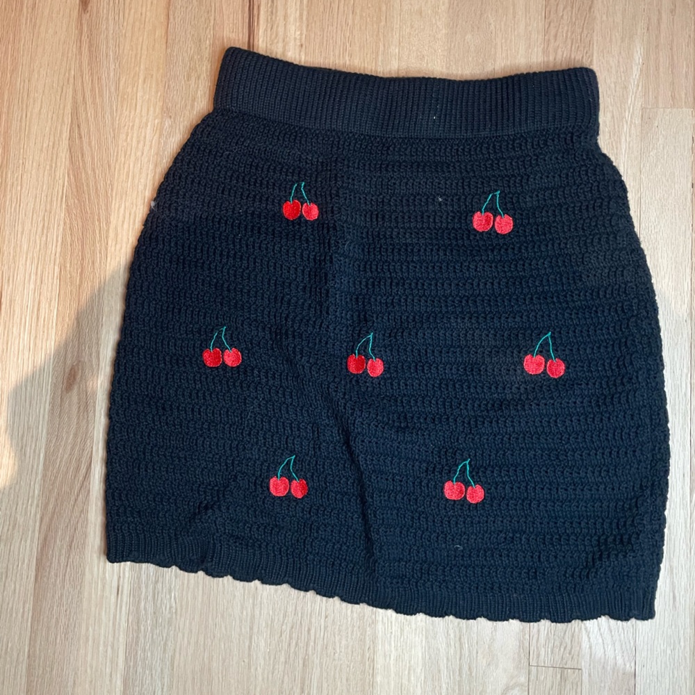 Black crochet skirt with cherries